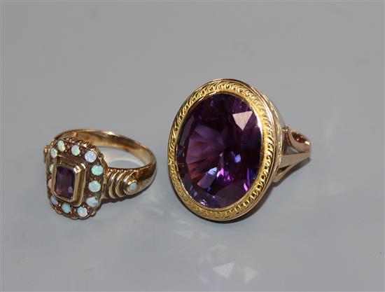 A 375 yellow metal, white opal and amethyst ring and a yellow metal and gem set ring.